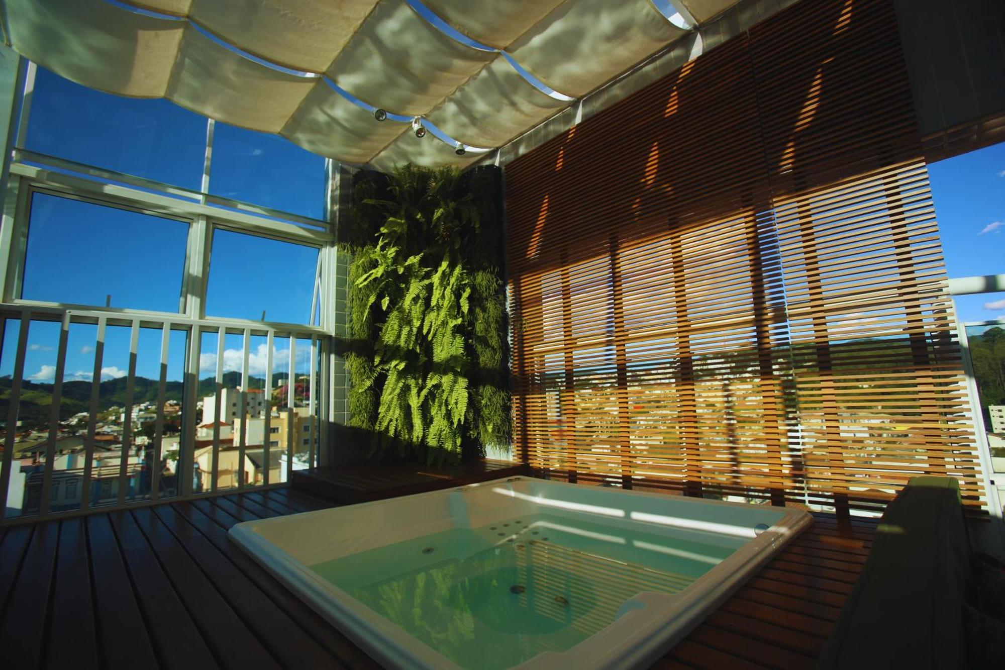 Gontijo Inn Hotel Itajubá Extérieur photo A rooftop spa